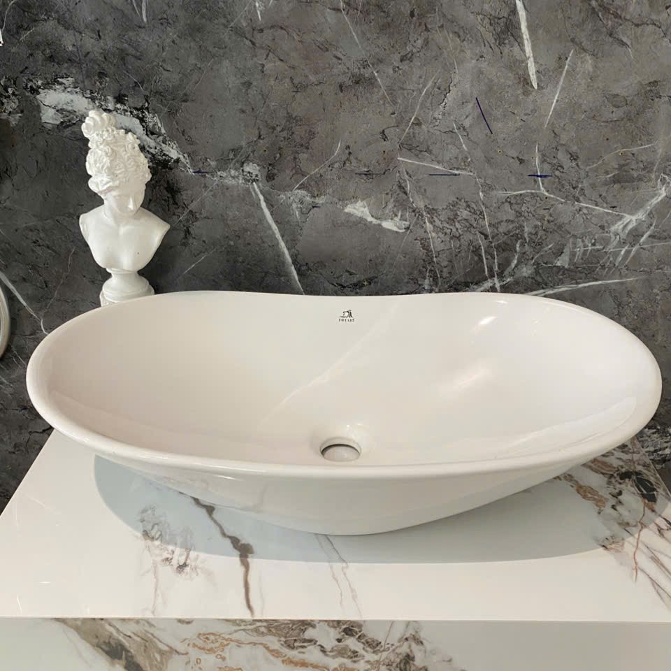 Lavabo men sứ tráng viền Fotari H-113 